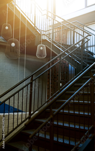 The stairway to success. Shot of a staircase in a building.