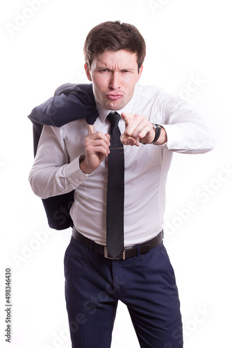 young white handsome man in a shirt strict office suit stands isolated on a white background