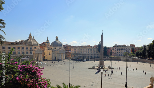 People s Square in Roma called Piazza del Popolo in Italian Language and bougainvillea flowers photo