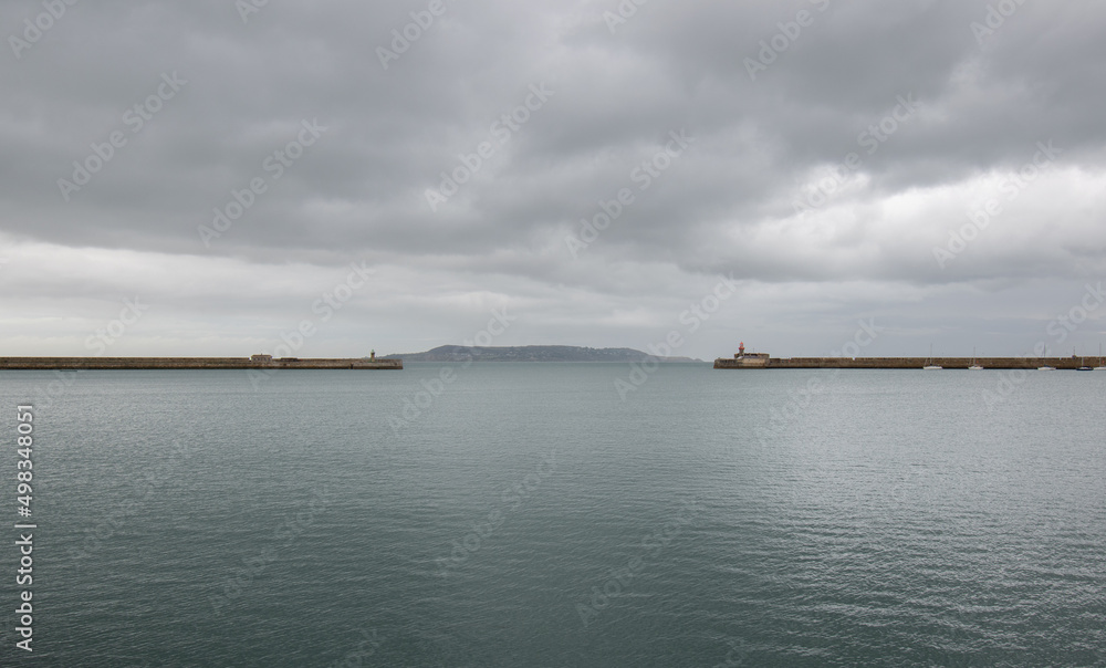 Dun Laoghaire port entry with West pier and East pier light houses