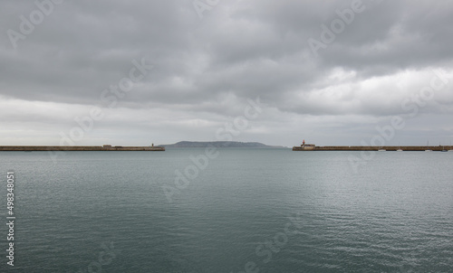 Dun Laoghaire port entry with West pier and East pier light houses