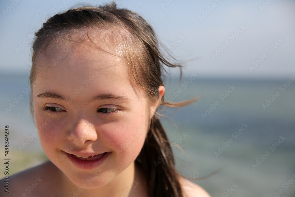 Portrait of little girl smiling on the background of the sea Portrait of little girl smiling on the background of the sea