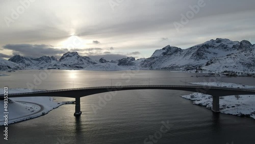 Flight under the sea water bridge at sunset