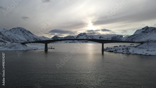 Flight under the sea water bridge at sunset