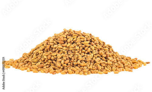 Dried fenugreek seeds isolated on a white background. Fenugreek seeds spices.