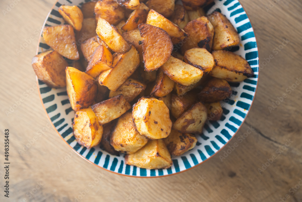Fototapeta premium Roasted potatoes served in bowl
