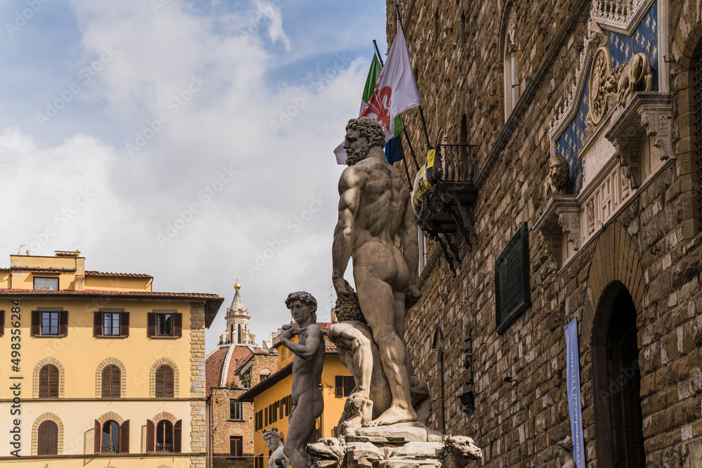 View of Palazzo Vecchio and cathedra in Florence, Italy including the statue of David. 