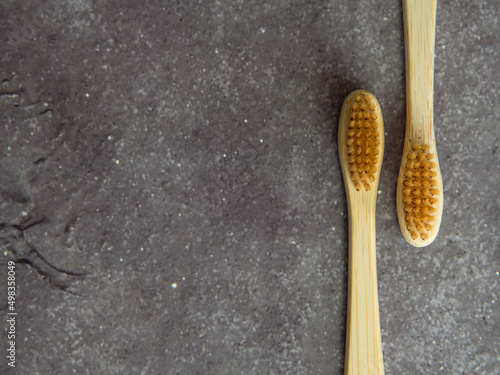 Natural bamboo toothbrushes close up. dental care, plastic free concept. Copy space for text