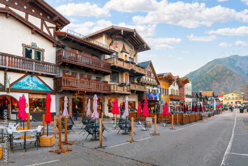 The main street through the Bavarian themed village of Leavenworth with outdoor sidewalk cafes lining up in the late Autumn in Eastern Washington State, USA. photo