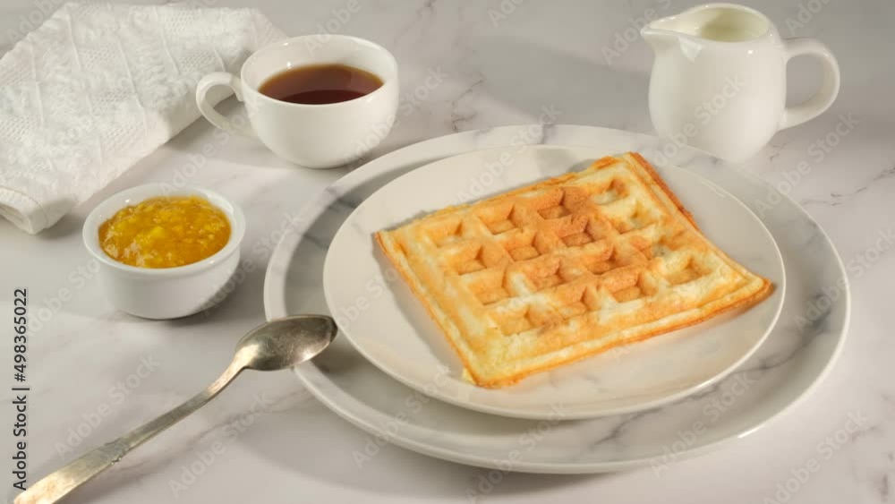Belgian waffles for breakfast on a flat table Belgian waffles for breakfast on a flat table