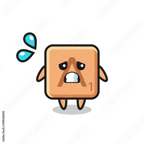 scrabble mascot character with afraid gesture