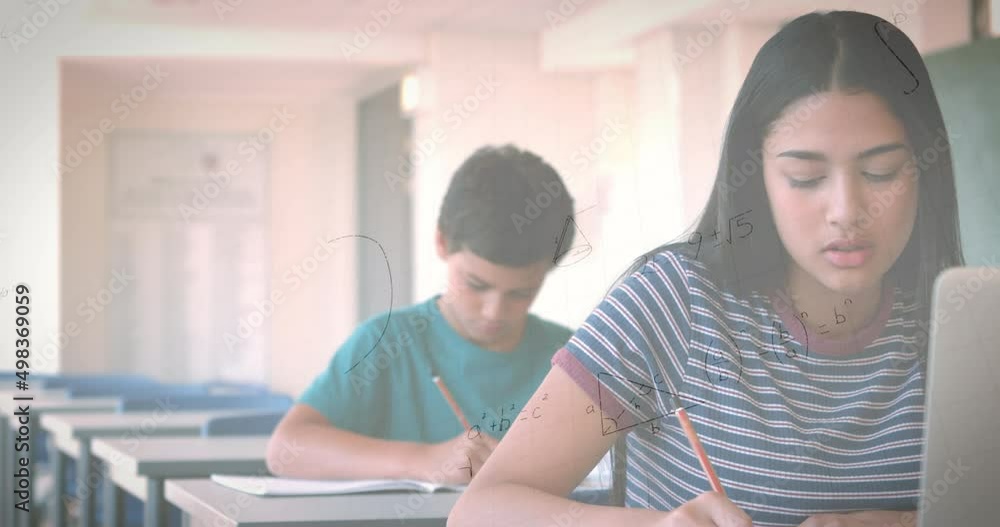Animation of mathematical equations over schoolgirl using laptop in classroom Animation of mathematical equations over schoolgirl using laptop in classroom