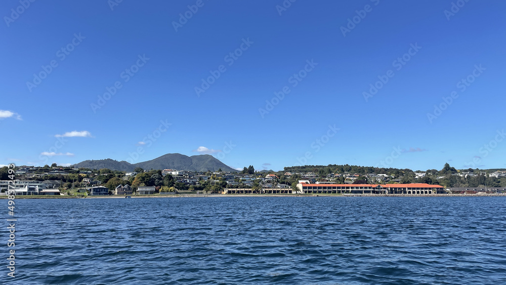 Lake Taupo New Zealand taken from the lake looking towards Mt Tauhara and the hotels on the Lake Front