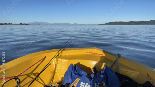 Fishing for Trout on Lake Taupo looking towards Mt Ruapehu. New Zealand