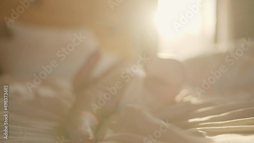 Wallpaper Mural Baby Hands Playing with Baby Feet Close Up. a close up profile of a baby playing with his own feet in slow motion Torontodigital.ca