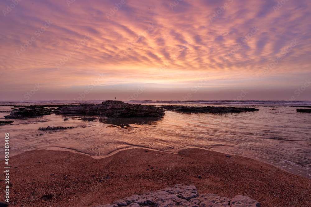 Obraz premium Sunset on the beach of Nazare in Portugal