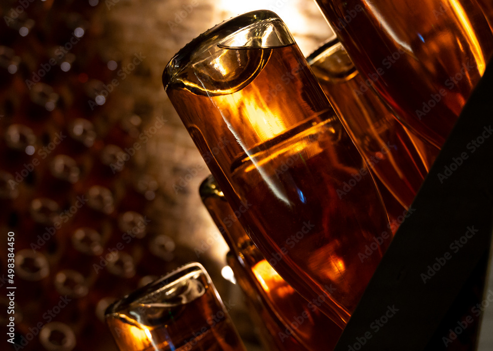 Sparkling wine production by traditional method in underground cellars in Vienna, Austria Sparkling wine production by traditional method in underground cellars in Vienna, Austria