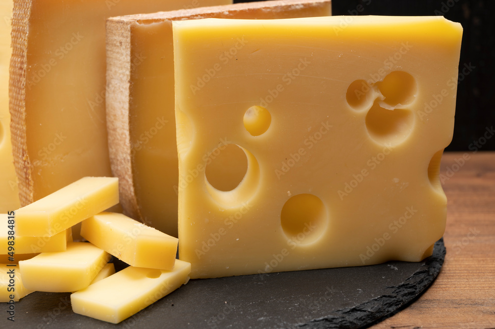 Swiss cheese collection, emmentaler with holes, gruyere, appenzeller ...