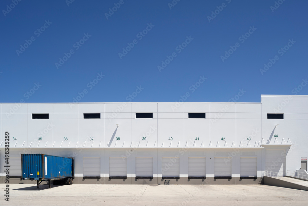 Cargo container parked in a distribution loading dock