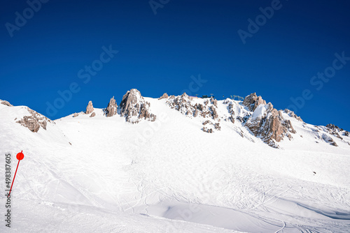 Fotografia, Obraz Ski trails on idyllic white landscape