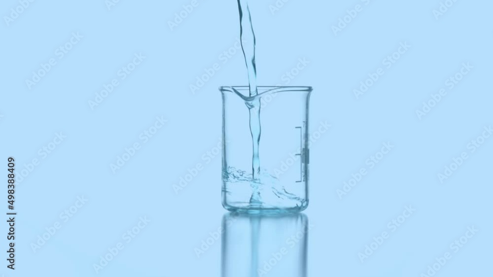 Animation of hexagons rotating over liquid pouring into glass container Animation of hexagons rotating over liquid pouring into glass container