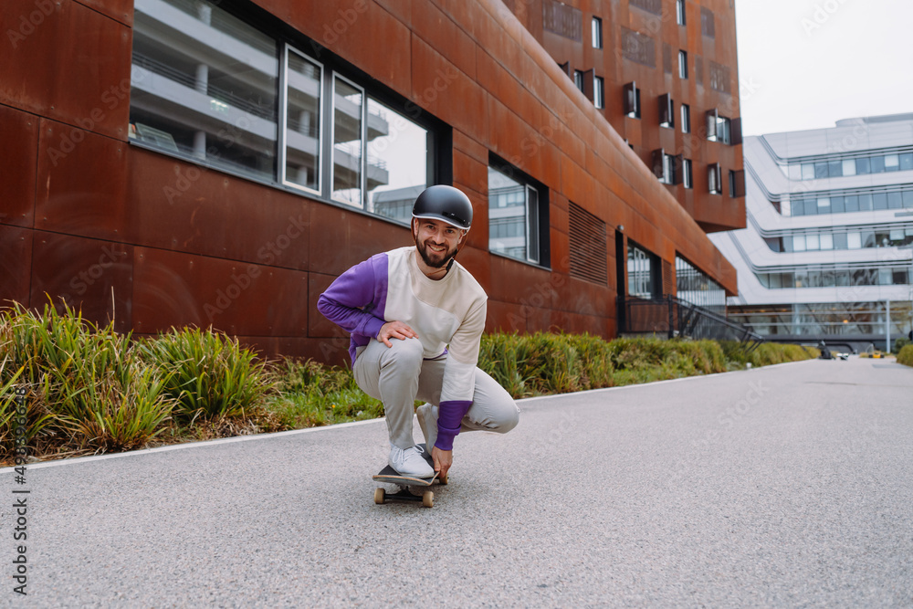 portrait of a skater. A skateboarder at an urban location . man enjoys the ride portrait of a skater. A skateboarder at an urban location . man enjoys the ride