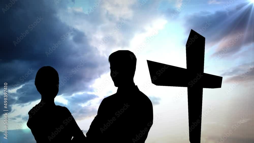 Animation of silhouette of couple over clouds and cross Animation of silhouette of couple over clouds and cross