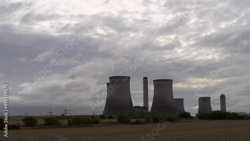 Time lapse clouds behind Didcot Power Station. photo