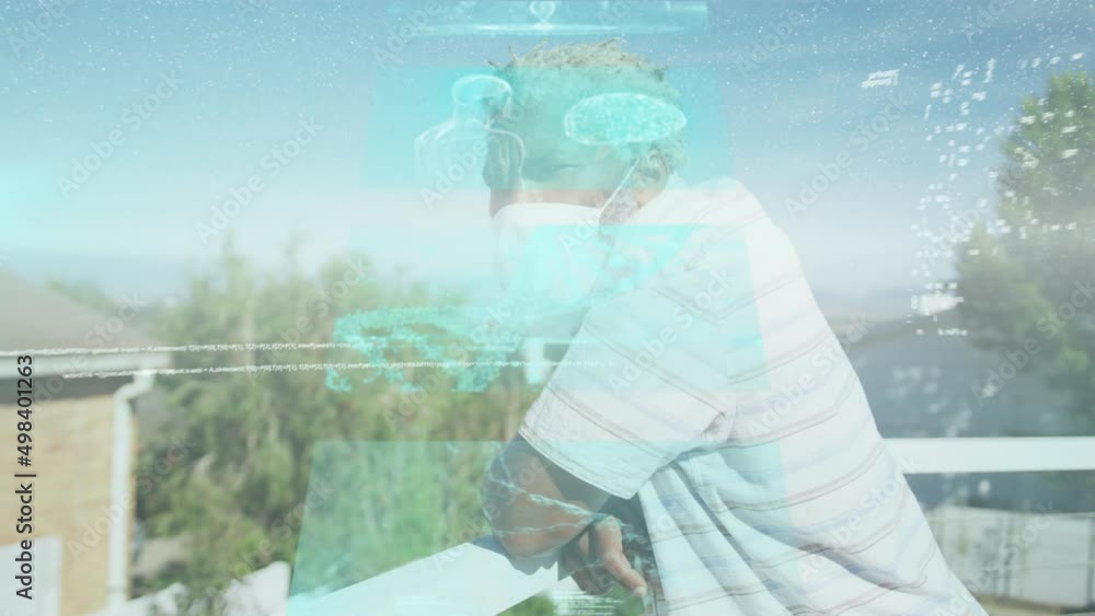 Animation of data processing over african american man wearing face mask Animation of data processing over african american man wearing face mask