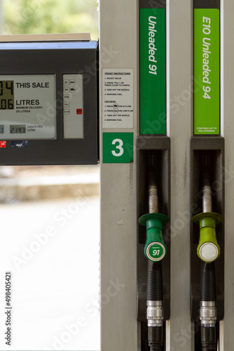 Unleaded 91 and E10 fuel nozzles at petrol pump bowser.