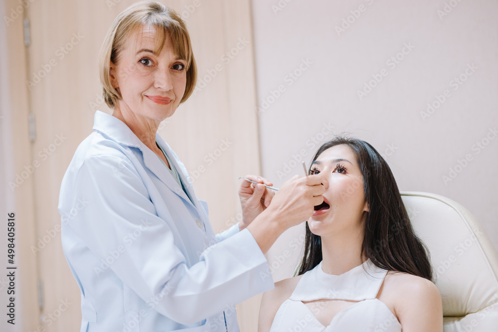 Woman having teeth examined at dentists Woman having teeth examined at dentists
