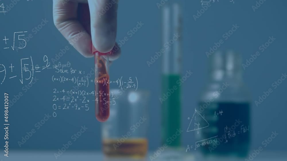 Animation of mathematical formulas over scientist in laboratory Animation of mathematical formulas over scientist in laboratory