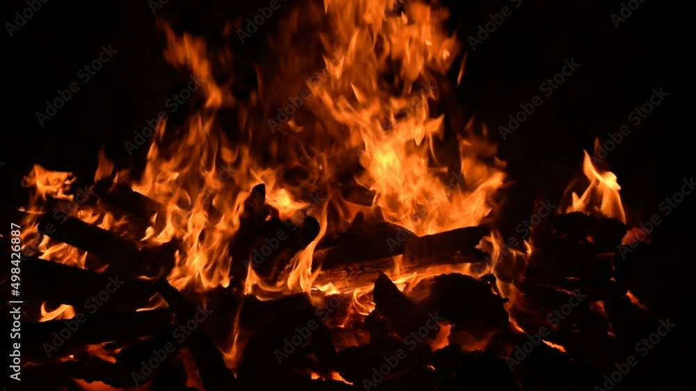 Fire flames on black background, Blaze fire flame texture background, Beautifully, the fire is burning, Fire flames with wood and cow dung bonfire Fire flames on black background, Blaze fire flame texture background, Beautifully, the fire is burning, Fire flames with wood and cow dung bonfire
