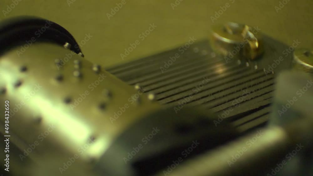 Extreme close up of a music box movement, seamless loop Extreme close up of a music box movement, seamless loop