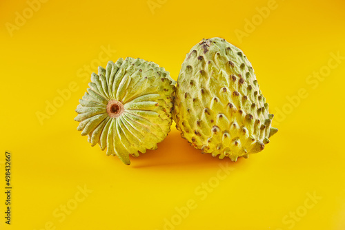 Cherimoya, sugar apple or custard apple or pineapple sugar apple in Taiwan isolated on yellow background photo