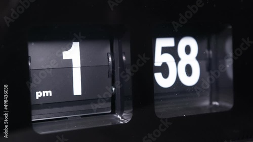 24 hours flip clock in time lapse photo