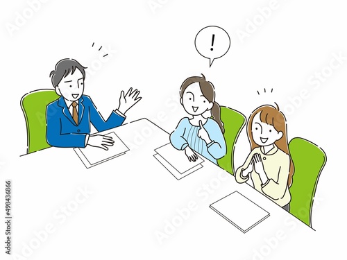 会社で会議するビジネスマンとOL