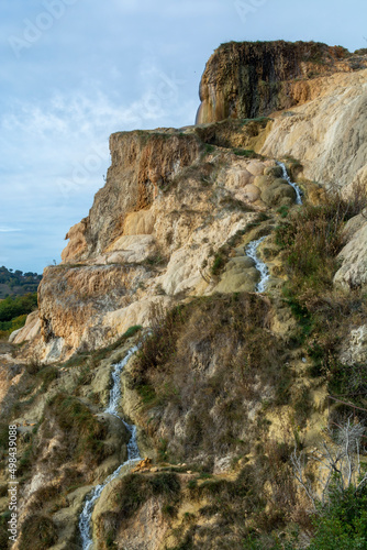 Ancient hot thermal springs and pool in nature park Dei Mulini, Bagno Vignoni, Tuscany, Italy