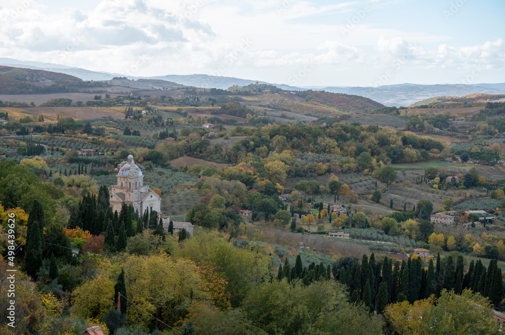 Naklejka premium View on hills and vineyards near old town Montepulciano, Tuscany, Italy
