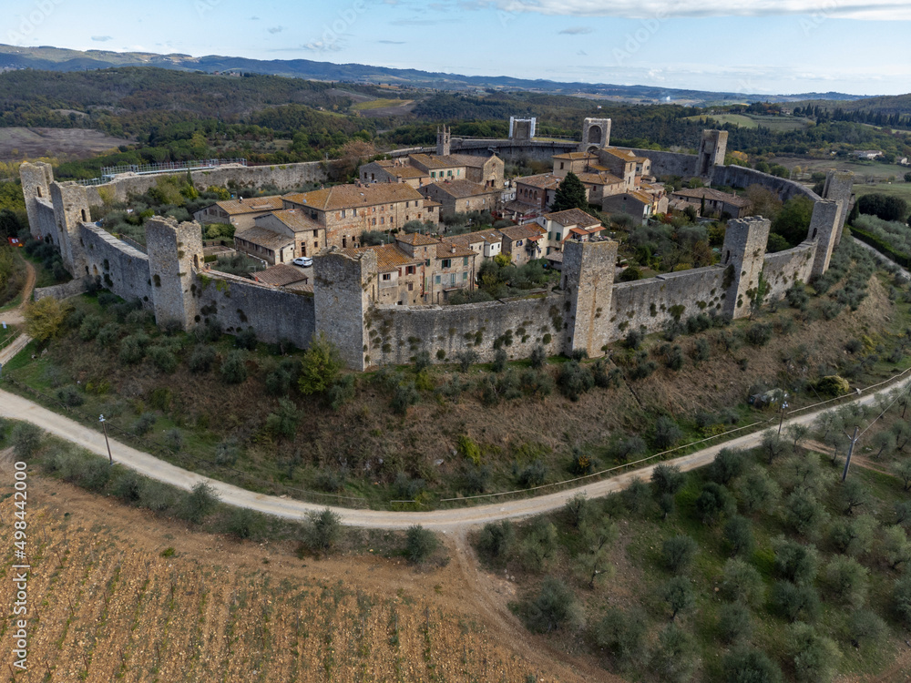 Aeriel view on medieval fortress town on hilltop Monteriggione in Tuscany, Italy
