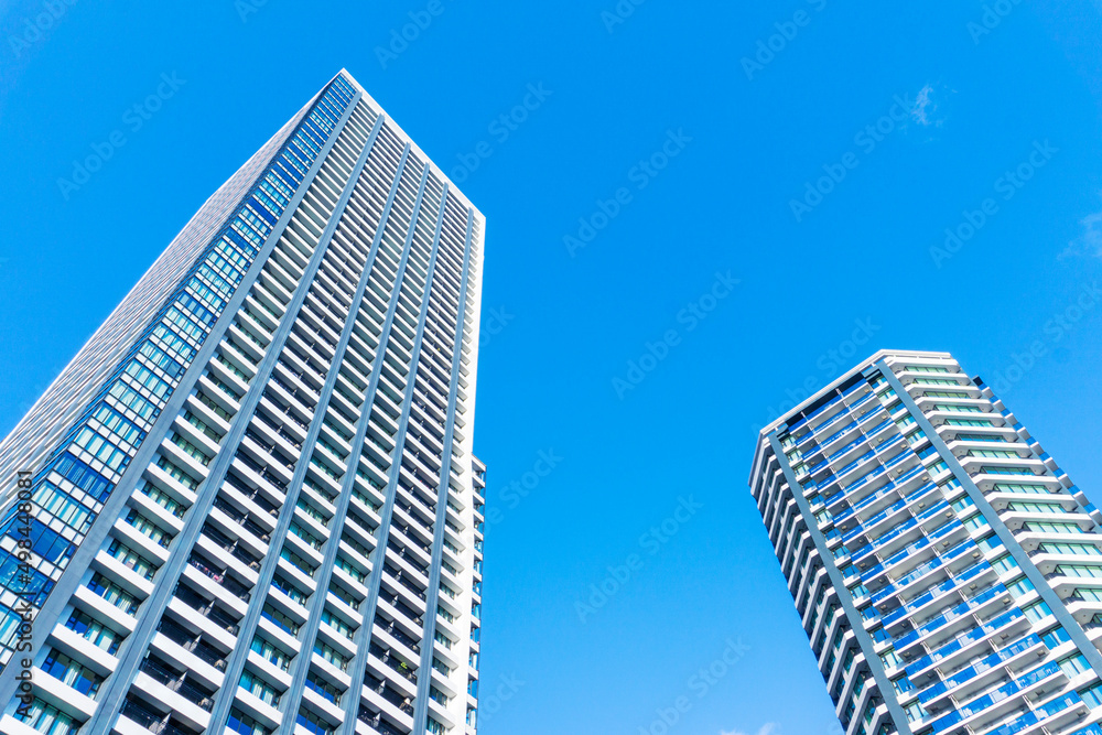 Landscape photograph looking up at a high-rise apartment_c_80