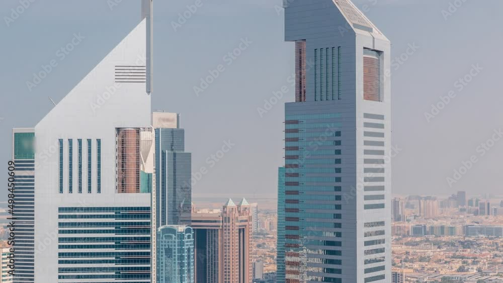 The view on Emirates Towers and Deira district aerial timelapse The view on Emirates Towers and Deira district aerial timelapse