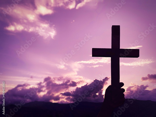 Photography Lent Season,Holy Week and Good Friday concepts - silhouette of cross shape in purple background