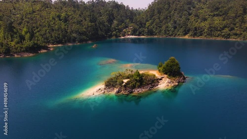 Aerial: beautiful island in blue water, Lagunas de Montebello Mexico, 4K scenery photo