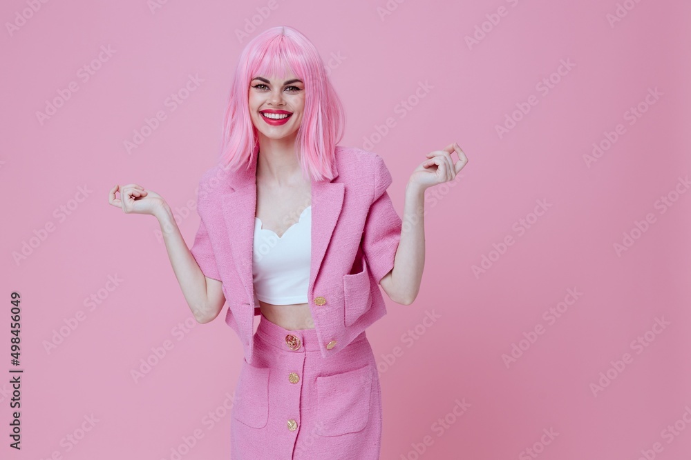 Beauty Fashion woman gestures with his hands with a pink jacket color background unaltered Beauty Fashion woman gestures with his hands with a pink jacket color background unaltered