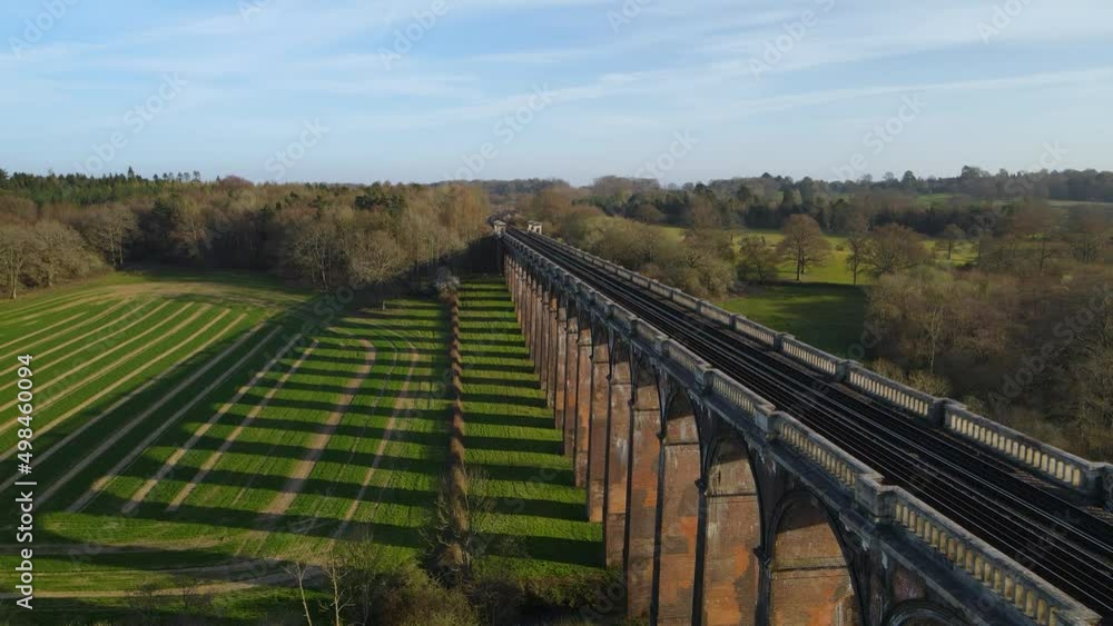 Aerial drone flyback along Ouse Valley or Balcombe viaduct surrounded by verdant landscape, Sussex. UK Aerial drone flyback along Ouse Valley or Balcombe viaduct surrounded by verdant landscape, Sussex. UK