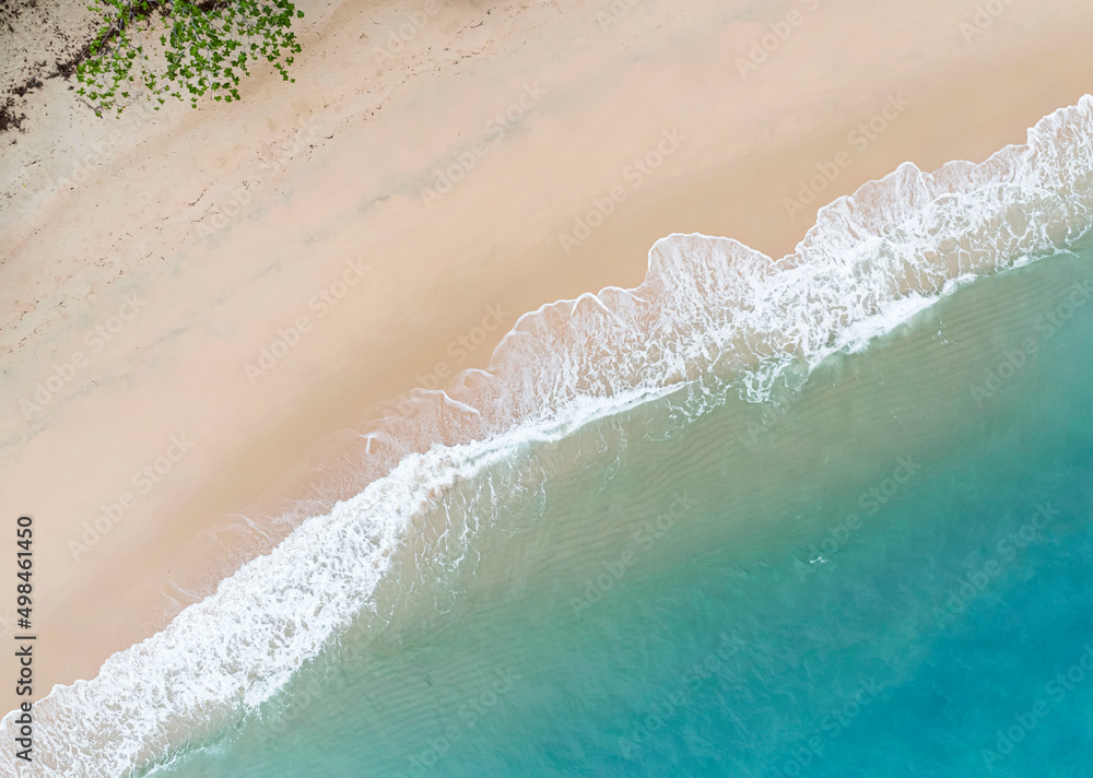 Aerial view of Summer tropical background of water wave on the beach,top view image
