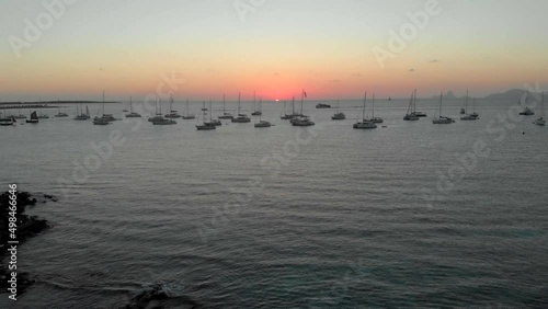 Drone video of the sun going down during the summer in Formentera photo