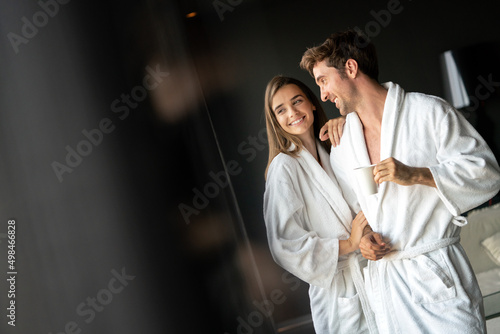 Canvastavla Happy married couple relaxing at wellness spa resort