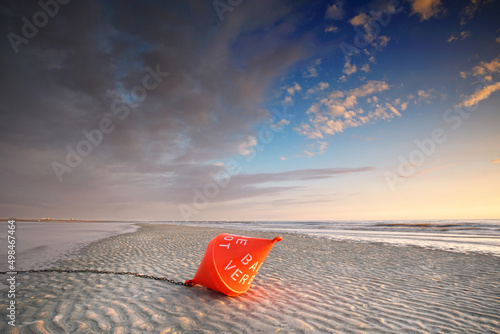 Fotografie vacation at the summer beach with orange buoy